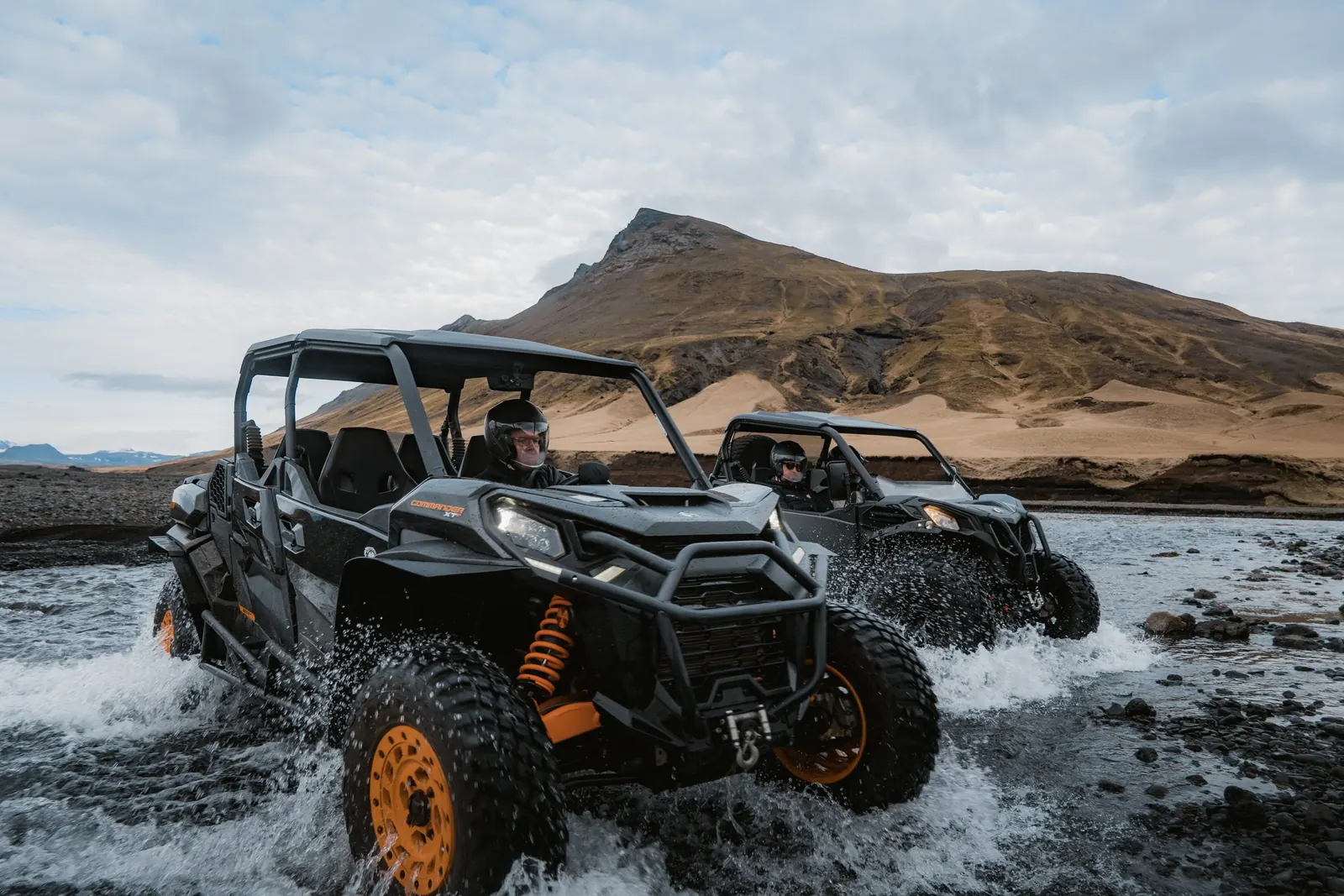 Tindasel buggies crossing a river